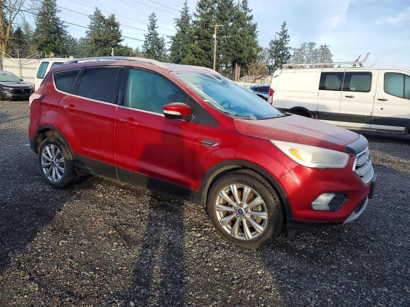 Photo 4 from auction – 2018 FORD ESCAPE TIT with VIN 1FMCU9J98JUC10354