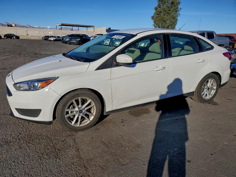 FORD FOCUS SE 2018 with VIN 1FADP3F23JL230659 - Photo from auction