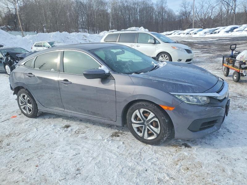 Photo 4 from auction – 2018 HONDA CIVIC LX with VIN 2HGFC2F5XJH601348