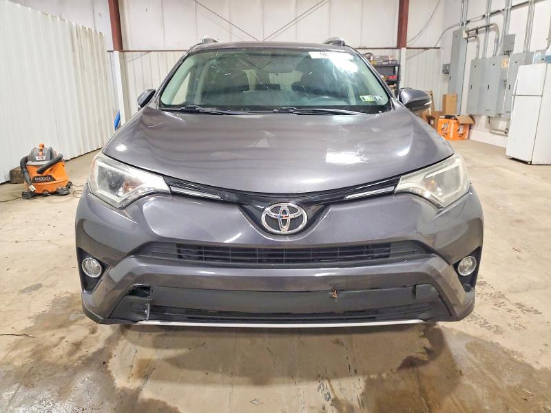 Photo 5 from auction – 2016 TOYOTA RAV4 XLE with VIN 2T3RFREV9GW530052