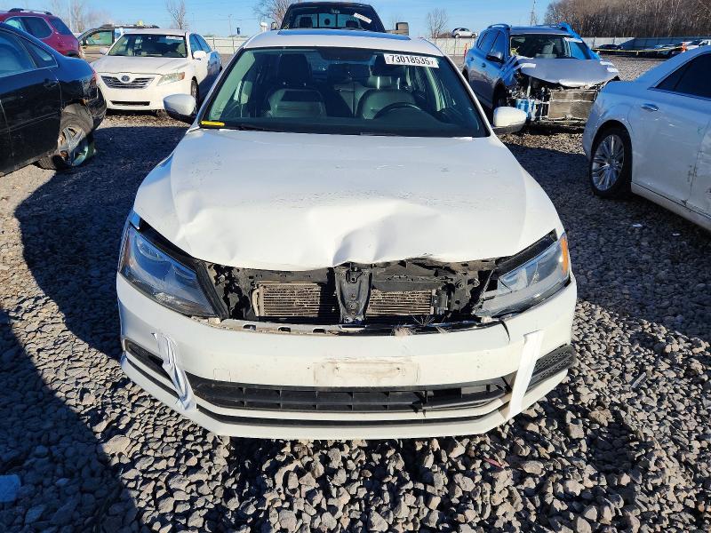 Photo 5 from auction – 2015 VOLKSWAGEN JETTA with VIN 3VWD07AJ4FM409512