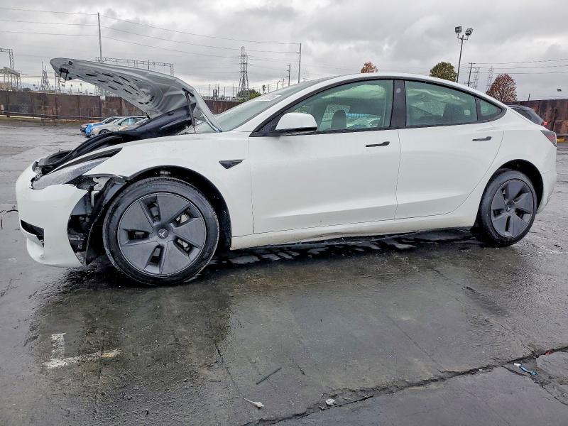 TESLA MODEL 3 2023 with VIN 5YJ3E1EA5PF555527 - Photo from auction