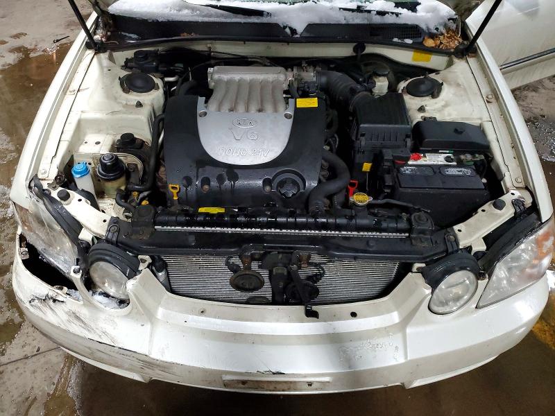 Photo 11 from auction – 2004 KIA OPTIMA LX with VIN KNAGD128245312998