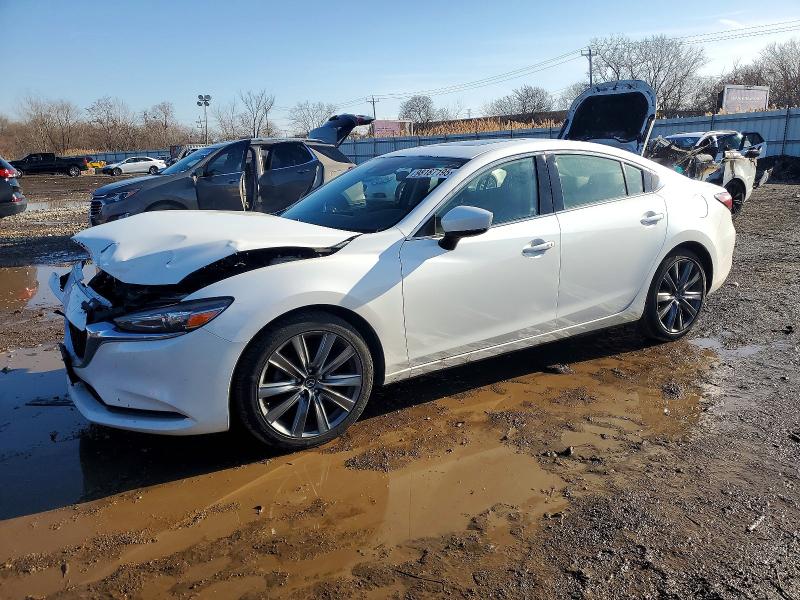 MAZDA 6 2018 with VIN JM1GL1VM5J1312513 - Photo from auction