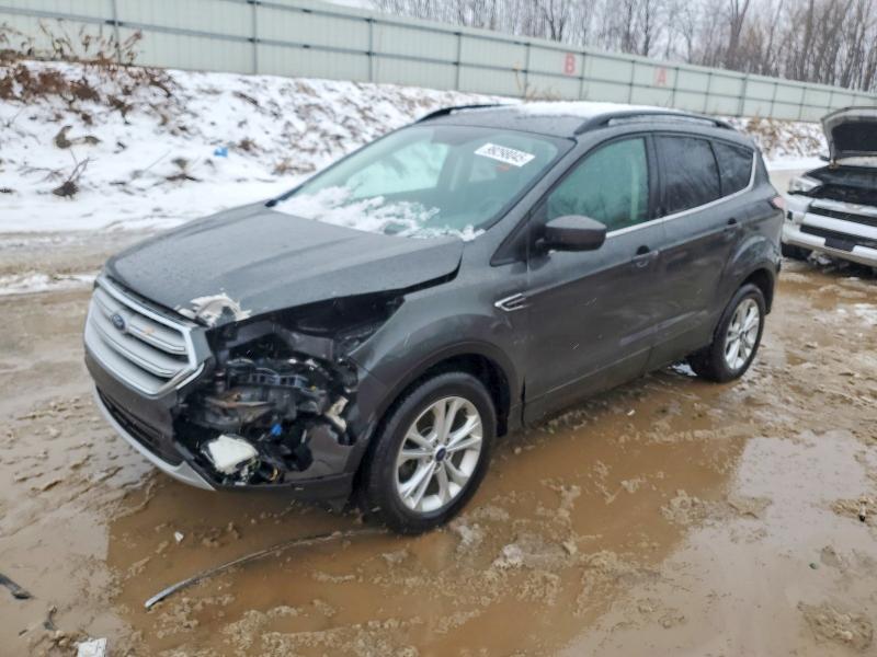 FORD ESCAPE SE 2018 with VIN 1FMCU9GD7JUC33698 - Photo from auction