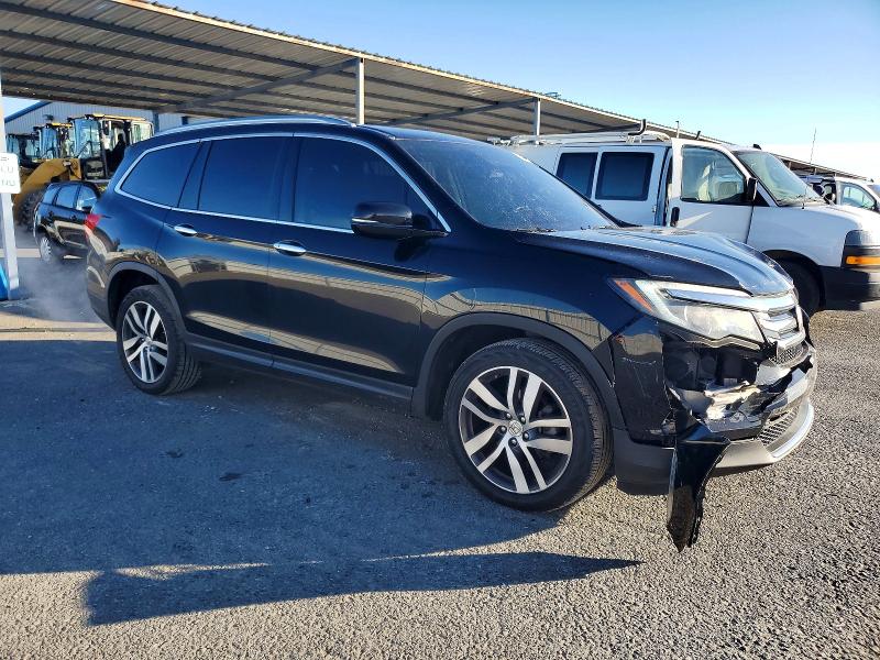 Photo 4 from auction – 2017 HONDA PILOT ELIT with VIN 5FNYF6H0XHB035893