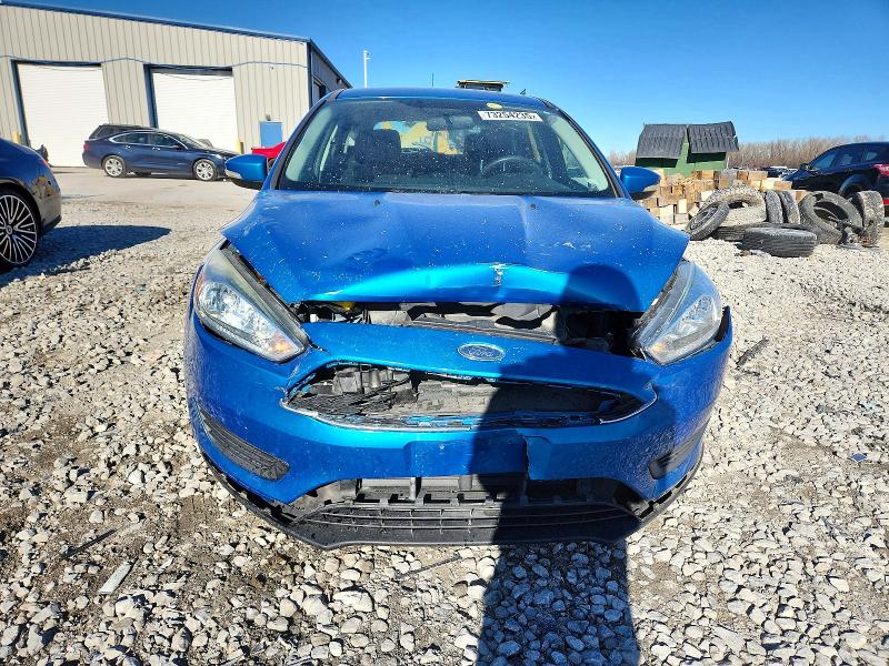 Photo 5 from auction – 2015 FORD FOCUS SE with VIN 1FADP3K21FL340963