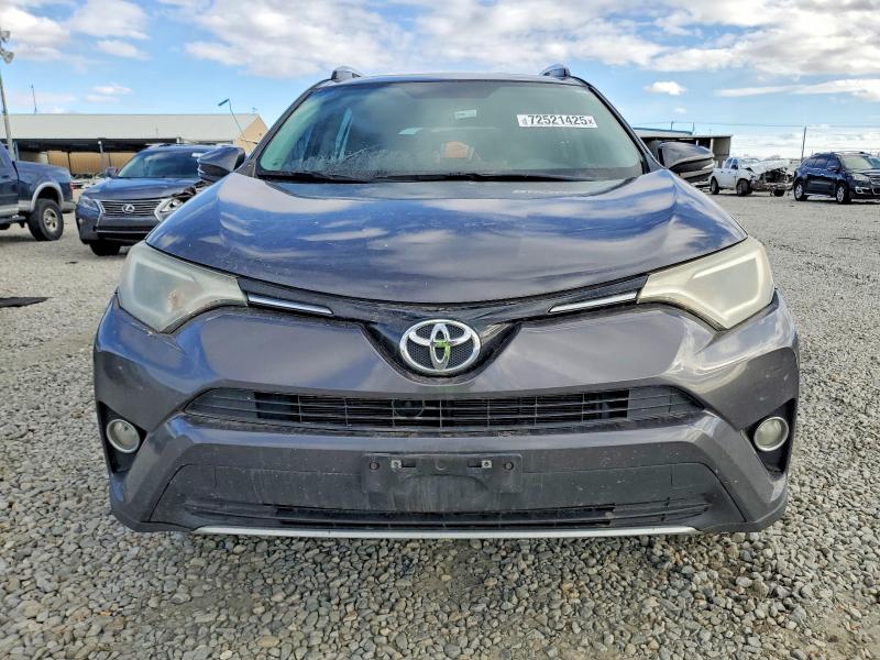 Photo 5 from auction – 2016 TOYOTA RAV4 XLE with VIN 2T3WFREV2GW256079