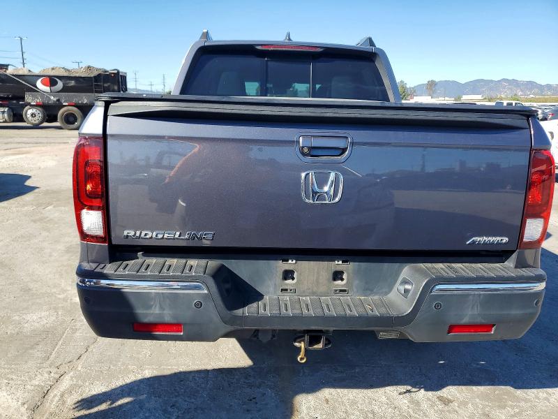 Photo 6 from auction – 2018 HONDA RIDGELINE with VIN 5FPYK3F74JB015548
