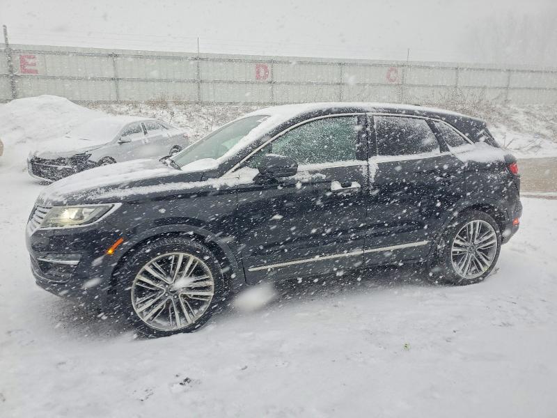 LINCOLN MKC 2015 with VIN 5LMTJ2AHXFUJ38004 - Photo from auction