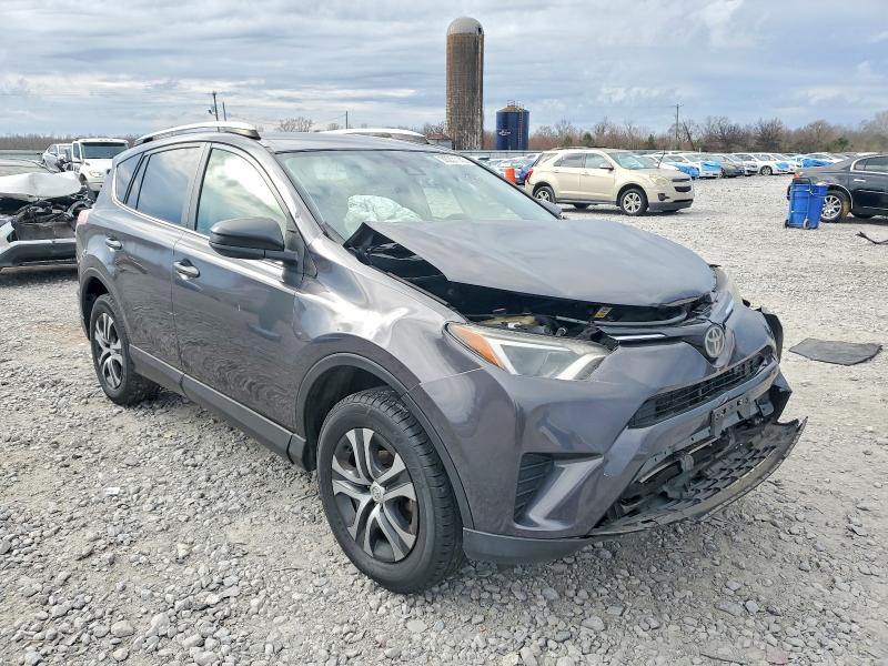 Photo 4 from auction – 2017 TOYOTA RAV4 LE with VIN JTMZFREV1HJ711940