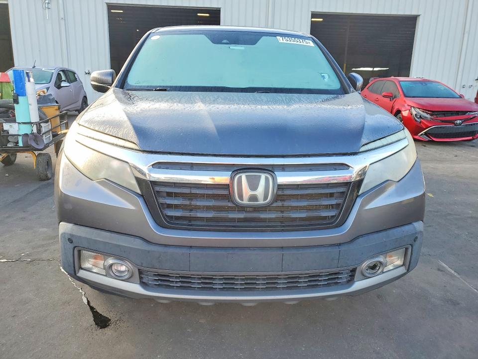 Photo 5 from auction – 2019 HONDA RIDGELINE with VIN 5FPYK3F79KB002344