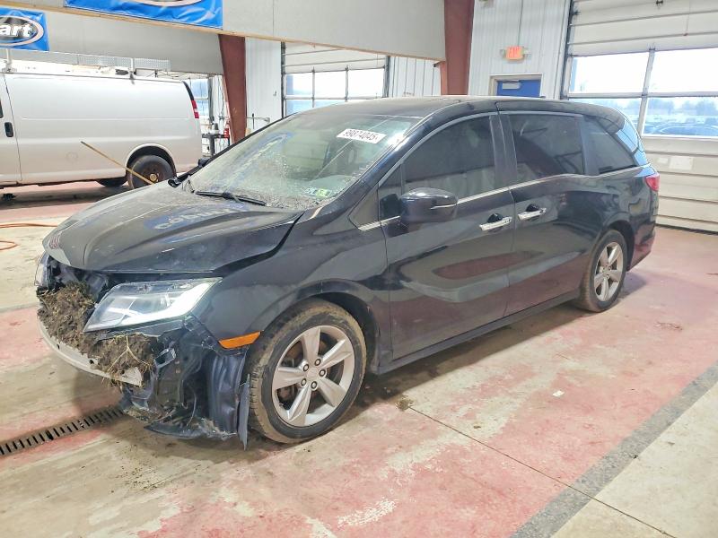 HONDA ODYSSEY 2018 with VIN 5FNRL6H73JB073627 - Photo from auction
