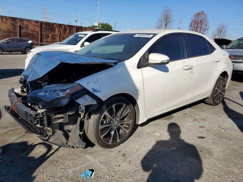 TOYOTA COROLLA L 2018 con VIN 5YFBURHE6JP744632 - Foto de la subasta
