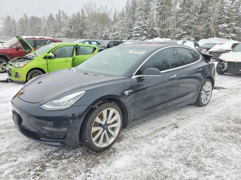 TESLA MODEL 3 2018 with VIN 5YJ3E1EB2JF106824 - Photo from auction