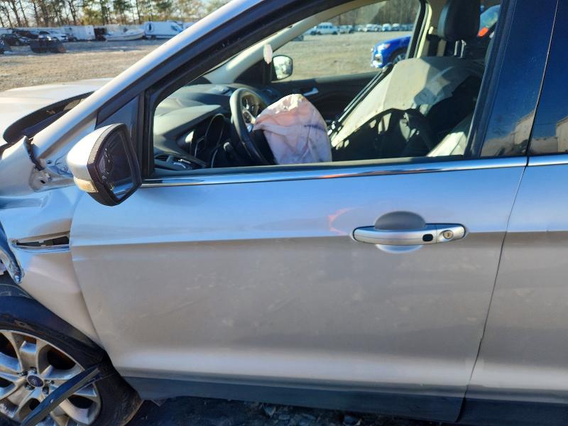 Photo 7 from auction – 2014 FORD ESCAPE TIT with VIN 1FMCU9J98EUB75210