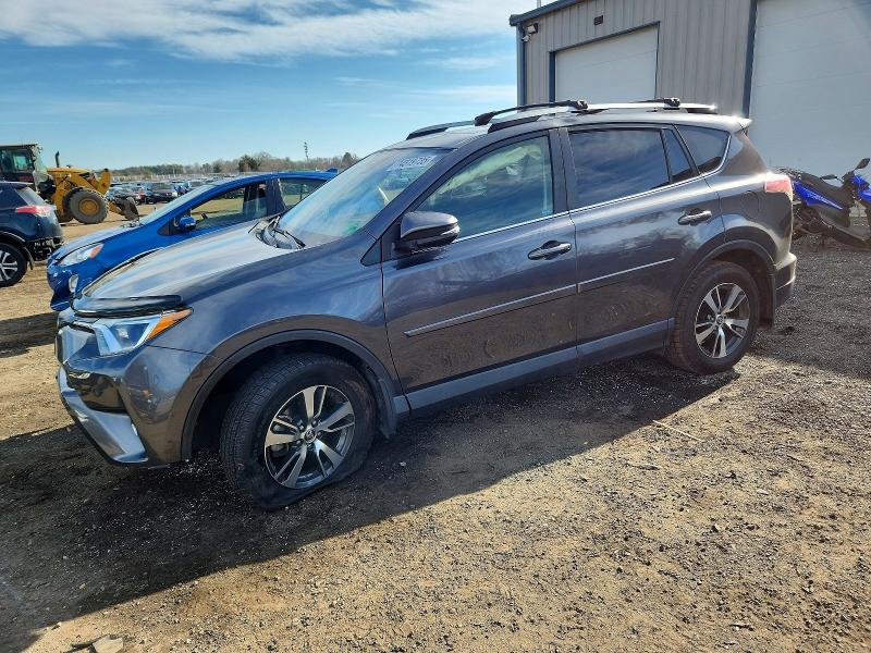 TOYOTA RAV4 2018 with VIN JTMRFREV6JD235446 - Photo from auction