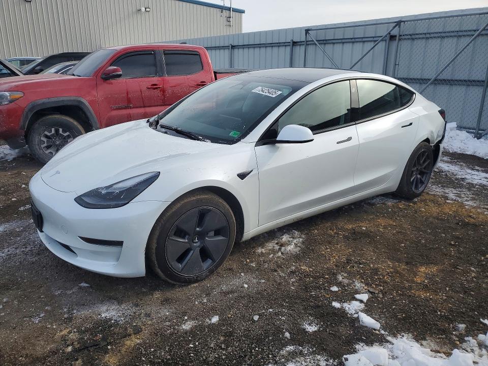 TESLA MODEL 3 2023 with VIN 5YJ3E1EAXPF599037 - Photo from auction