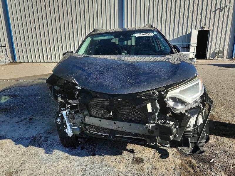 Photo 5 from auction – 2018 TOYOTA RAV4 with VIN 2T3WFREV8JW499144