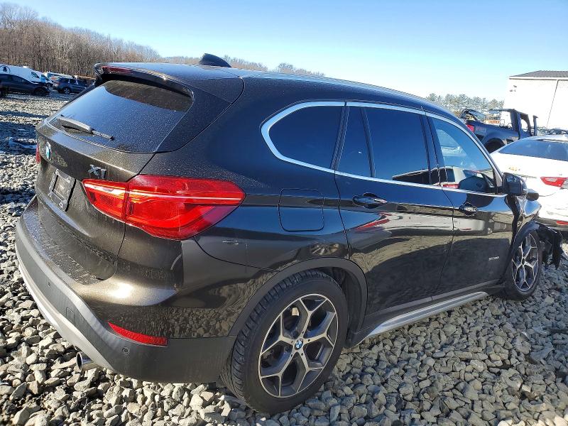Photo 3 from auction – 2017 BMW X1 with VIN WBXHU7C33H5H33993