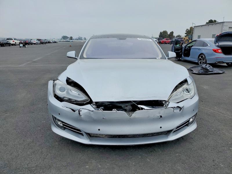 Photo 5 from auction – 2014 TESLA MODEL S with VIN 5YJSA1S17EFP33222