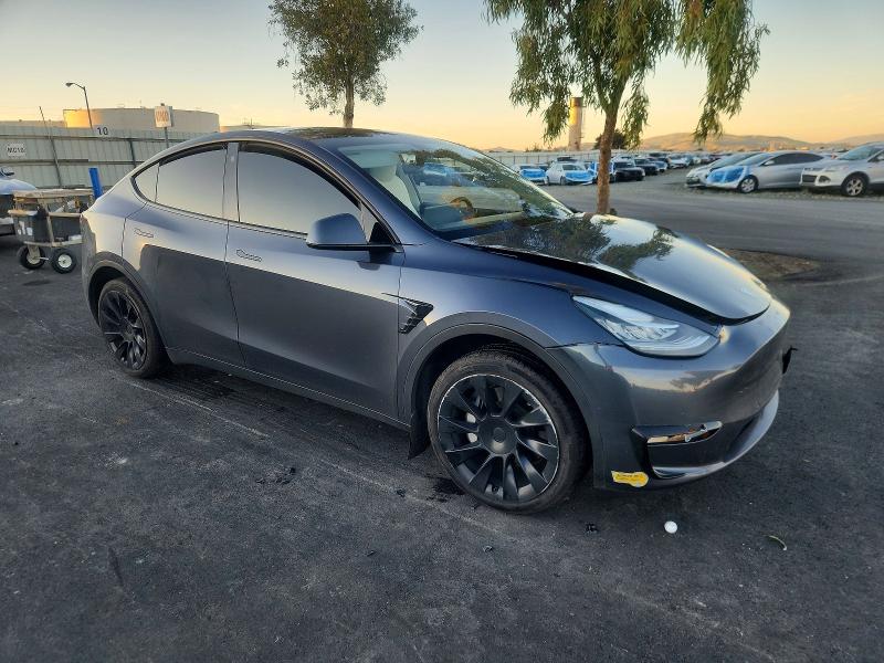 Photo 4 from auction – 2022 TESLA MODEL Y with VIN 7SAYGDEE3NF314487