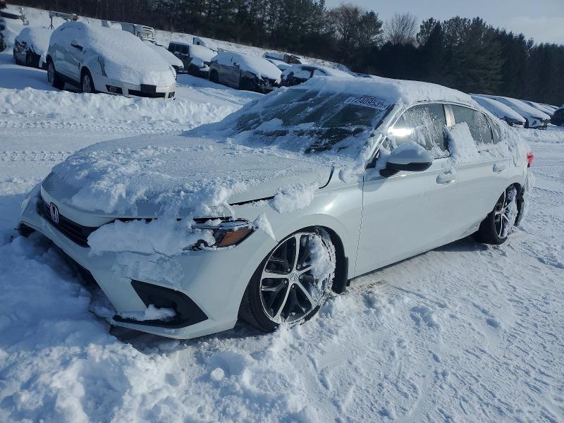 HONDA CIVIC 2022 with VIN 2HGFE1F99NH003667 - Photo from auction