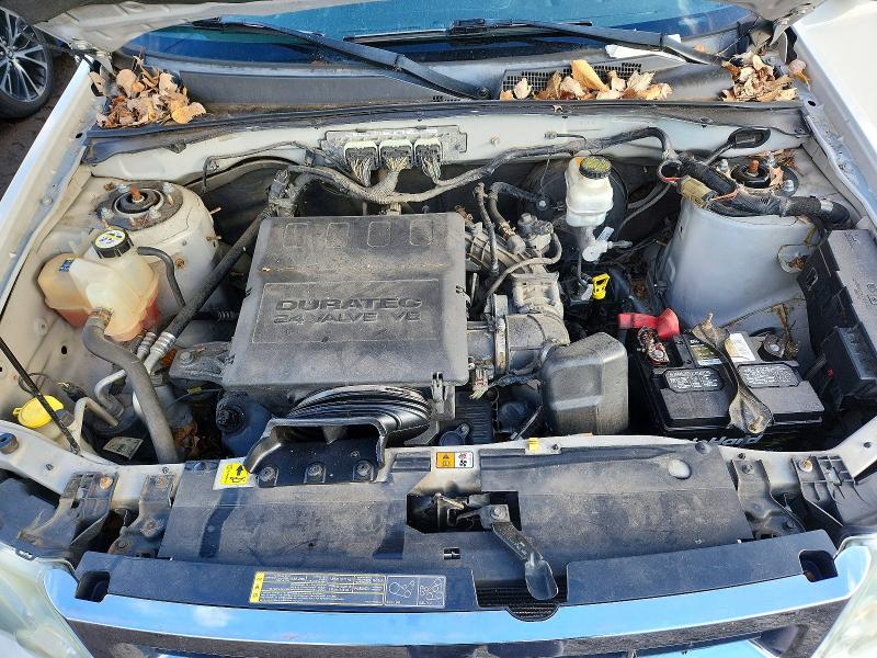 Photo 12 from auction – 2011 FORD ESCAPE LIM with VIN 1FMCU0EG8BKB97140