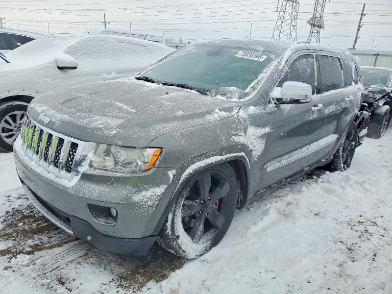 JEEP GRAND CHEROKEE 2011 with VIN 1J4RR6GT4BC722499 - Photo from auction