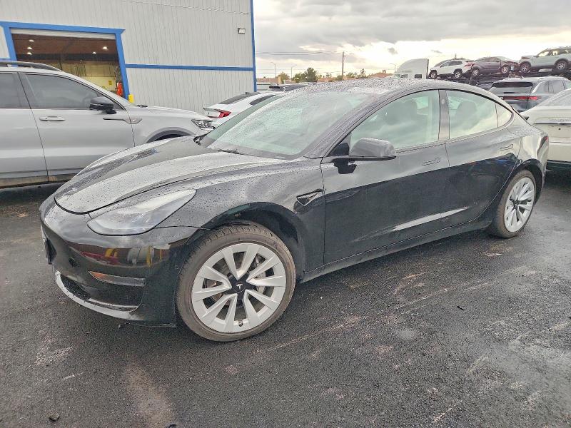 TESLA MODEL 3 2022 with VIN 5YJ3E1EAXNF291301 - Photo from auction