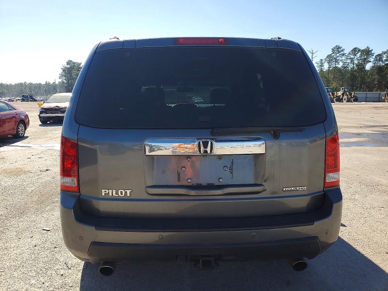 Photo 6 from auction – 2010 HONDA PILOT TOUR with VIN 5FNYF3H95AB008975