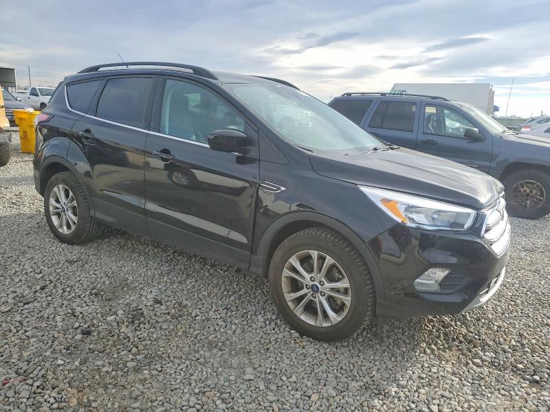 Photo 4 from auction – 2018 FORD ESCAPE SE with VIN 1FMCU9GD9JUC61857