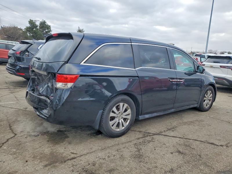Photo 3 from auction – 2014 HONDA ODYSSEY EX with VIN 5FNRL5H63EB058164