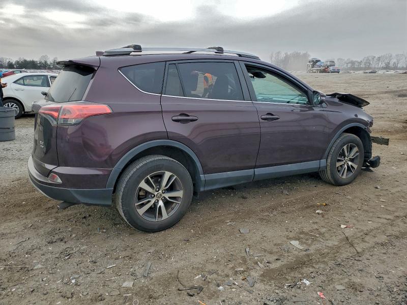 Photo 3 from auction – 2017 TOYOTA RAV4 XLE with VIN 2T3RFREV9HW664190