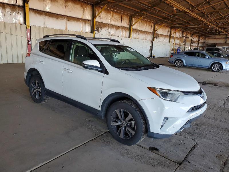 Photo 4 from auction – 2018 TOYOTA RAV4 with VIN JTMWFREV2JJ152973