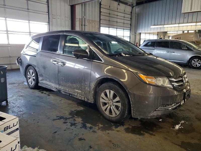 Photo 4 from auction – 2016 HONDA ODYSSEY with VIN 5FNRL5H68GB020769