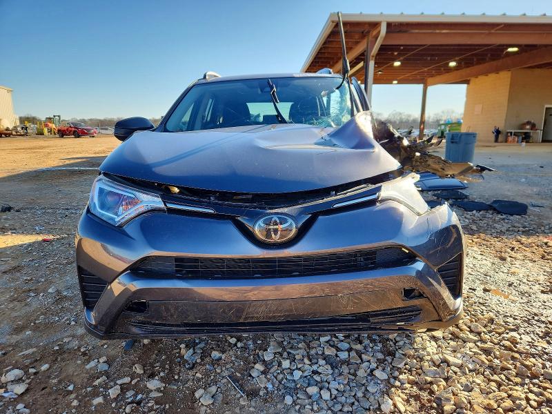 Photo 5 from auction – 2018 TOYOTA RAV4 LE with VIN JTMZFREV1JJ733832