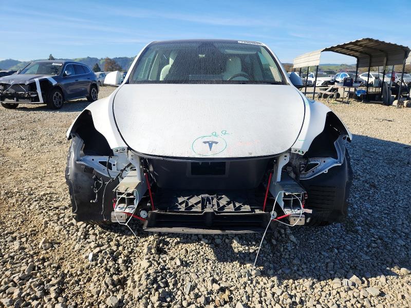 Photo 5 from auction – 2021 TESLA MODEL Y with VIN 5YJYGAEE2MF174894