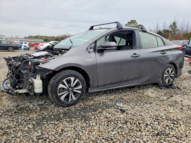 TOYOTA PRIUS PRIM 2018 with VIN JTDKARFP7J3086986 - Photo from auction