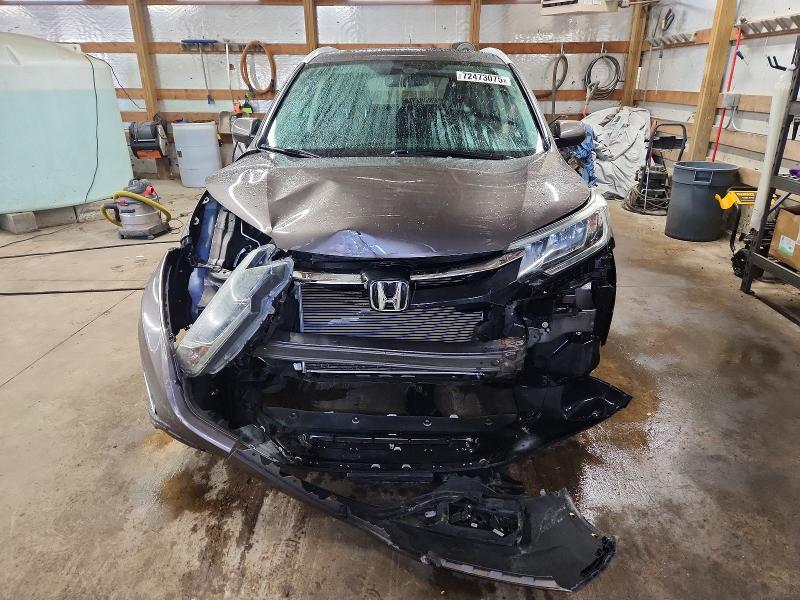 Photo 5 from auction – 2016 HONDA CR-V EXL with VIN 2HKRM4H71GH673798