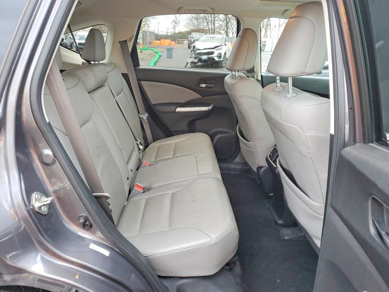 Photo 10 from auction – 2015 HONDA CR-V with VIN 2HKRM4H74FH613271