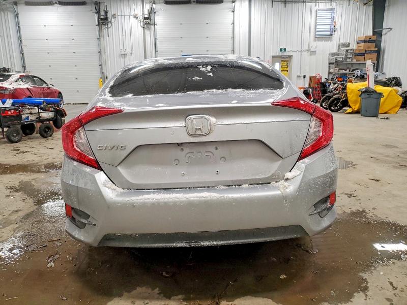 Photo 6 from auction – 2018 HONDA CIVIC with VIN 2HGFC2F55JH001871