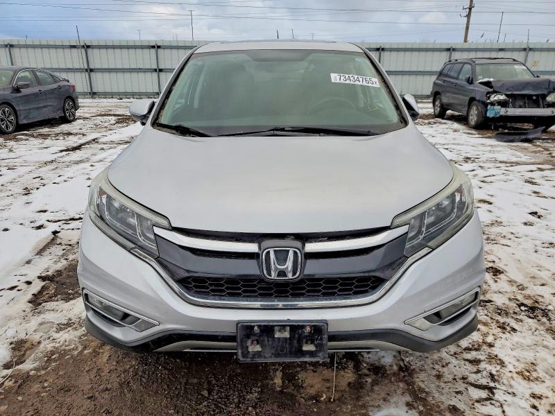 Photo 5 from auction – 2016 HONDA CR-V EX with VIN 5J6RM4H55GL060927