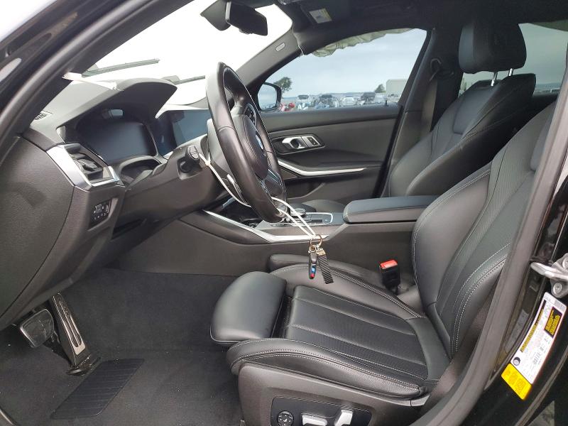 Photo 7 from auction – 2022 BMW M340I with VIN 3MW5U7J05N8C30029
