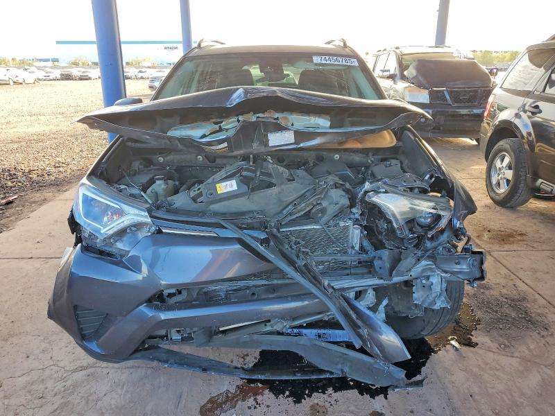 Photo 5 from auction – 2017 TOYOTA RAV4 LE with VIN JTMZFREV1HJ123472