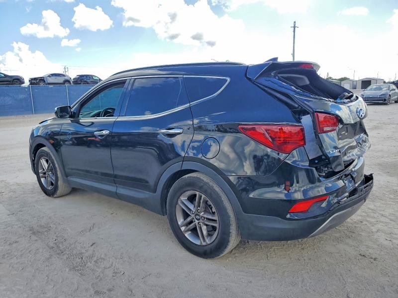 Photo 2 from auction – 2017 HYUNDAI SANTA FE S with VIN 5NMZU3LB5HH014725