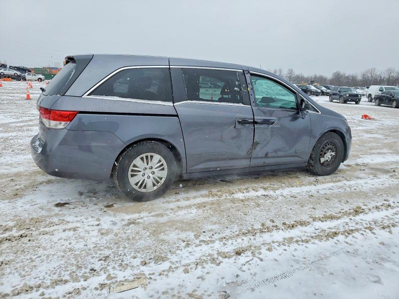 Photo 3 from auction – 2014 HONDA ODYSSEY with VIN 5FNRL5H28EB072719