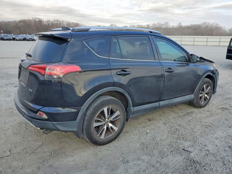 Photo 3 from auction – 2016 TOYOTA RAV4 with VIN 2T3WFREVXGW265743