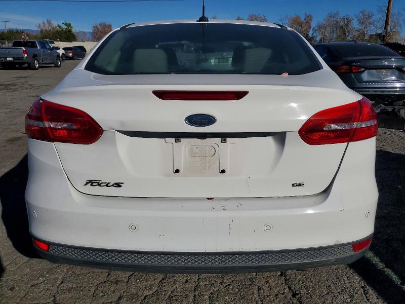 Photo 6 from auction – 2015 FORD FOCUS SE with VIN 1FADP3F25FL221274