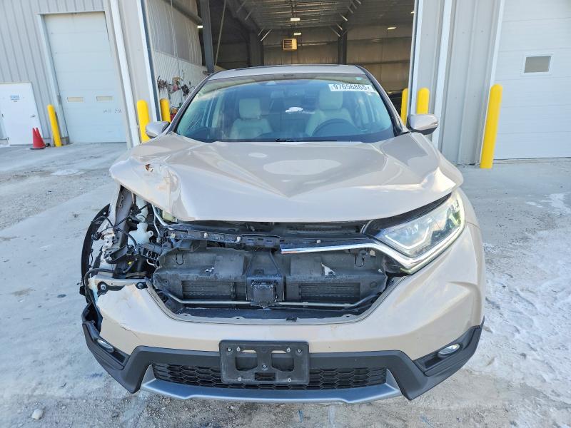 Photo 5 from auction – 2017 HONDA CR-V with VIN 5J6RW2H85HL037383